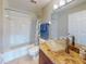 Clean bathroom with a bathtub and shower combo at 406 Bouchelle Dr # 206, New Smyrna Beach, FL 32169