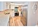 Modern kitchen with stainless steel appliances and light-colored cabinets at 4175 S Atlantic Ave # 4120, New Smyrna Beach, FL 32169