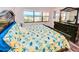 Bedroom with king-size bed and ocean view at 4175 S Atlantic Ave # 4120, New Smyrna Beach, FL 32169