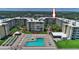 Aerial view of condo complex with pool, and oceanfront location at 4175 S Atlantic Ave # 4120, New Smyrna Beach, FL 32169