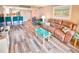 Open living area with light flooring and comfortable seating at 4175 S Atlantic Ave # 4120, New Smyrna Beach, FL 32169