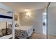 Bedroom with full-size bed, bunk bed, and mirrored closet at 5301 S Atlantic Ave # 52, New Smyrna Beach, FL 32169