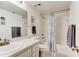 Clean bathroom with shower/tub combo and updated vanity at 5301 S Atlantic Ave # 52, New Smyrna Beach, FL 32169