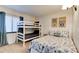 Bedroom with full-size bed and a bunk bed at 5301 S Atlantic Ave # 52, New Smyrna Beach, FL 32169