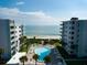 Oceanfront property featuring a kidney-shaped pool and beach access at 5301 S Atlantic Ave # 52, New Smyrna Beach, FL 32169