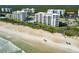 Aerial view of an oceanfront condo building at 5301 S Atlantic Ave # 52, New Smyrna Beach, FL 32169