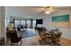 Bright dining area with ocean view and glass table for four at 5301 S Atlantic Ave # 52, New Smyrna Beach, FL 32169