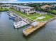 Aerial view of waterfront community with private boat docks and gazebo at 2100 N Peninsula Ave # 1150, New Smyrna Beach, FL 32169