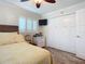 Bright bedroom with a double bed and ample closet space at 2100 N Peninsula Ave # 1150, New Smyrna Beach, FL 32169