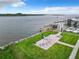 Seating area and waterfront view with access to boat docks at 2100 N Peninsula Ave # 1150, New Smyrna Beach, FL 32169