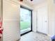 Florida room with sliding door leading to the backyard at 2100 N Peninsula Ave # 1150, New Smyrna Beach, FL 32169