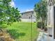 Landscaped backyard with lush greenery at 2100 N Peninsula Ave # 1150, New Smyrna Beach, FL 32169