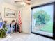 Florida room with backyard access and storage at 2100 N Peninsula Ave # 1150, New Smyrna Beach, FL 32169