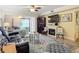 Living room with comfortable seating and a view of the water at 2100 N Peninsula Ave # 1150, New Smyrna Beach, FL 32169