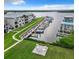 Aerial photo of waterfront property with private boat slips and seating area at 2100 N Peninsula Ave # 1150, New Smyrna Beach, FL 32169