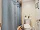 Clean bathroom with toilet and shower at 2100 N Peninsula Ave # 1150, New Smyrna Beach, FL 32169