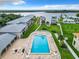 Aerial view of community pool and marina at 2100 N Peninsula Ave # 1150, New Smyrna Beach, FL 32169