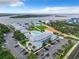 Aerial view of waterfront community with pool, parking and boat slips at 2100 N Peninsula Ave # 1150, New Smyrna Beach, FL 32169