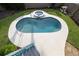Overlooking a kidney-shaped pool and adjacent spa at 320 Due East St, New Smyrna Beach, FL 32169