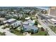 Elevated view of a house with a pool near the beach at 320 Due East St, New Smyrna Beach, FL 32169
