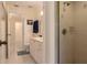 Clean bathroom with a shower, vanity, and toilet at 320 Due East St, New Smyrna Beach, FL 32169