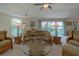 Comfortable living room with wicker furniture and ocean views at 320 Due East St, New Smyrna Beach, FL 32169
