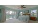 Light and airy bedroom with private balcony access at 320 Due East St, New Smyrna Beach, FL 32169