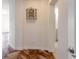 Elegant hallway with herringbone hardwood floors at 424 Luna Bella Ln # 433, New Smyrna Beach, FL 32168