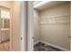 Walk-in closet with wire shelving and herringbone floor at 424 Luna Bella Ln # 433, New Smyrna Beach, FL 32168