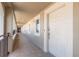 Building hallway with tiled floors and neutral walls at 424 Luna Bella Ln # 433, New Smyrna Beach, FL 32168