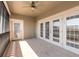 Covered balcony with tiled floors and ceiling fan at 424 Luna Bella Ln # 433, New Smyrna Beach, FL 32168