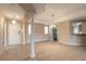 Elegant entryway with tile floors and views to dining and kitchen areas at 424 Luna Bella Ln # 433, New Smyrna Beach, FL 32168