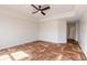 Spacious bedroom with hardwood floors and ceiling fan at 424 Luna Bella Ln # 433, New Smyrna Beach, FL 32168