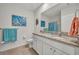 Double vanity bathroom with granite countertop and tile floor at 350 Sunset Point Dr, Ormond Beach, FL 32174