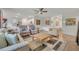 Open concept living room with access to kitchen at 350 Sunset Point Dr, Ormond Beach, FL 32174
