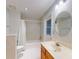 Clean bathroom with a tub shower, vanity, and toilet at 1780 Otisco Way, Winter Springs, FL 32708