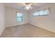 Bright bedroom with neutral carpeting and ceiling fan at 1780 Otisco Way, Winter Springs, FL 32708