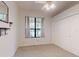 Bedroom with double door closet, window, and ceiling fan at 1780 Otisco Way, Winter Springs, FL 32708