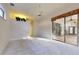 Spacious bedroom with access to a patio and carpet flooring at 1780 Otisco Way, Winter Springs, FL 32708