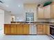 Kitchen boasts granite countertops and stainless steel appliances at 1780 Otisco Way, Winter Springs, FL 32708