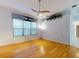 Bright living room featuring hardwood floors and large window at 1780 Otisco Way, Winter Springs, FL 32708