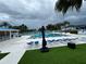 Community pool with lounge chairs and covered seating at 1780 Otisco Way, Winter Springs, FL 32708