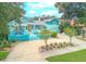 Home with a large yard, driveway, and landscaping at 412 S Peninsula Ave, New Smyrna Beach, FL 32169