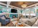 Living room boasts a fireplace and stylish coastal decor at 412 S Peninsula Ave, New Smyrna Beach, FL 32169
