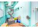 Outdoor shower area with a mermaid statue and plants at 412 S Peninsula Ave, New Smyrna Beach, FL 32169