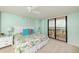 Main bedroom with water view and access to private balcony at 3855 S Atlantic Ave # 1206B, Daytona Beach, FL 32118
