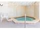 Relax in this tiled hot tub, perfect for unwinding after a long day at 3855 S Atlantic Ave # 1206B, Daytona Beach, FL 32118