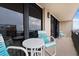 Private balcony with ocean view and outdoor seating at 4139 S Atlantic Ave # B103, New Smyrna Beach, FL 32169