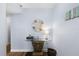 Condo entryway with glass-top console table at 4139 S Atlantic Ave # B103, New Smyrna Beach, FL 32169