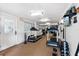 Well-equipped fitness center with treadmills and weights at 4139 S Atlantic Ave # B103, New Smyrna Beach, FL 32169